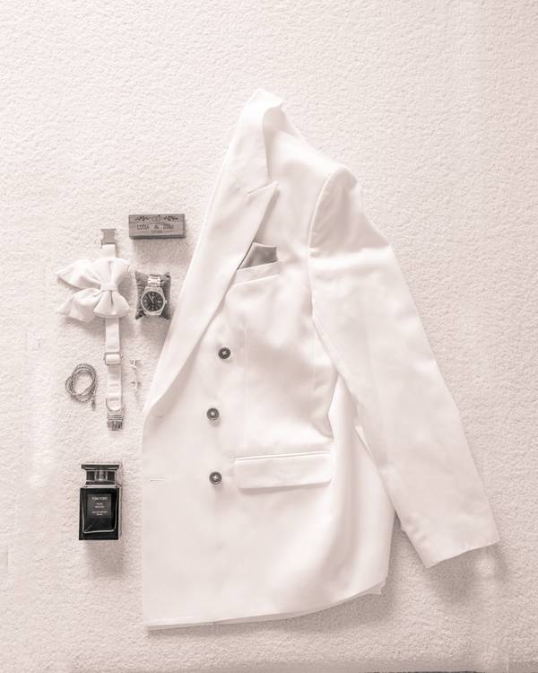 Groom's white jacket and accessories — wedding in Comporta